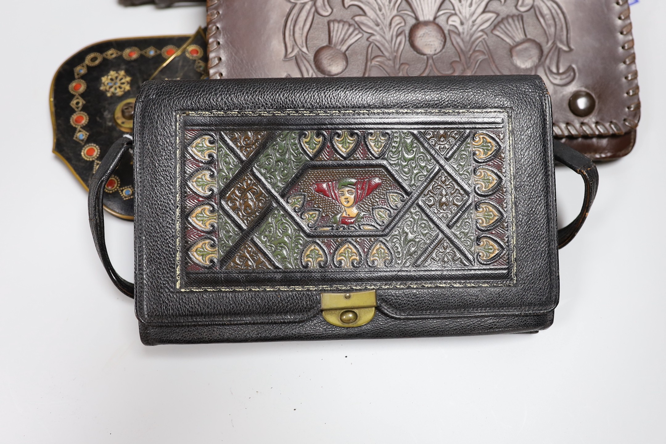 A small collection of unusual stained leather and a patchwork fabric and snake skin clutch bag (6)